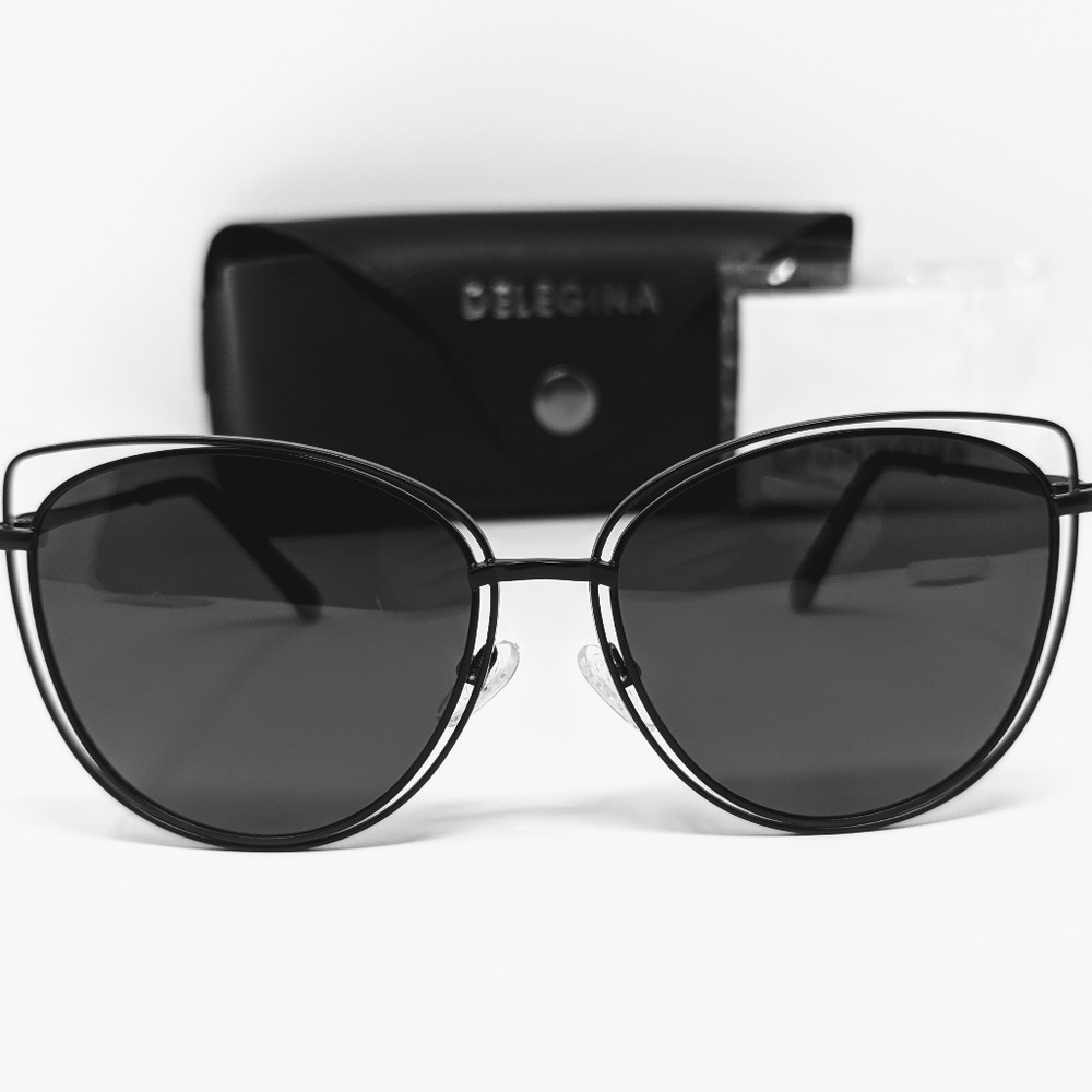 Stylish dark black sunglasses with bold gold trim - Picture 1 of 3